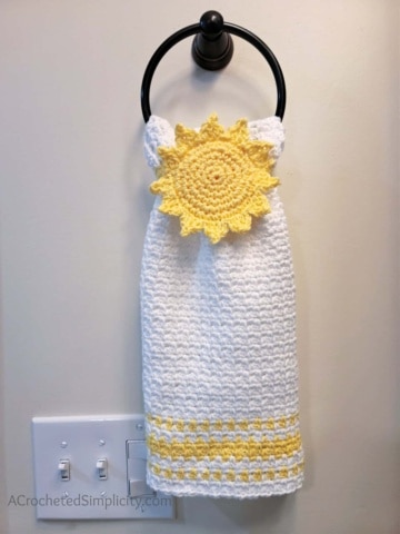 Free Crochet Towel Pattern - Hello Sunshine Keyhole Hand Towel by A Crocheted Simplicity #freecrochetpattern #freecrochettowelpattern #stayputtowel #stayputcrochettowel #keyholetowel #keyholecrochettowel #handmadetowel #crochettowelpattern #crochethandtowel #crochetlinenstitch #kitchentowel #crochetsun #sunhandtowel #summertowel #crochethandtowel