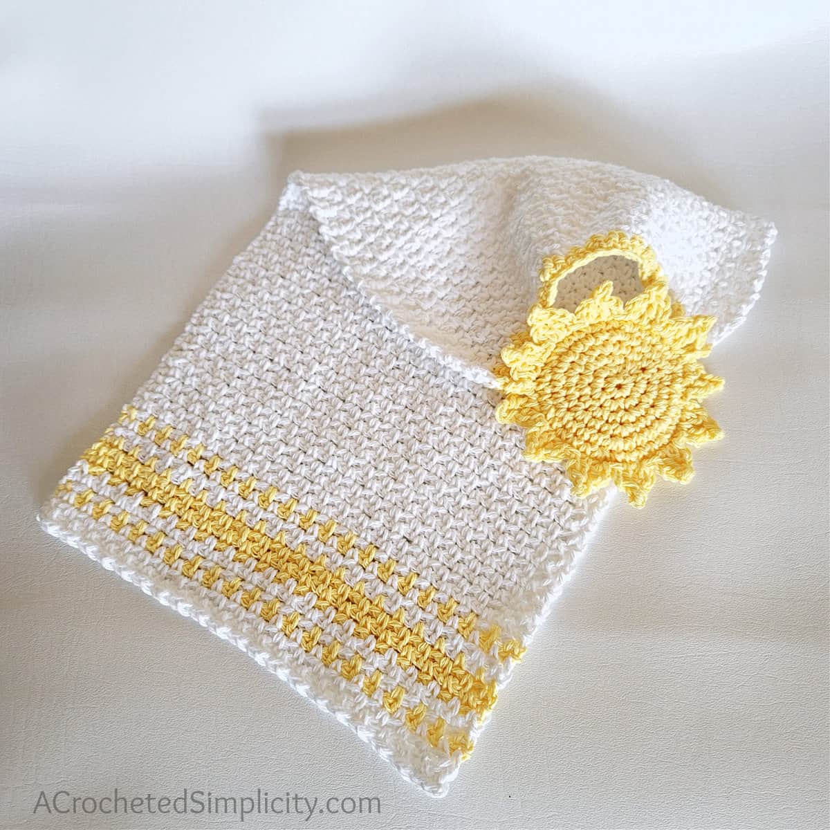 Free Crochet Towel Pattern - Hello Sunshine Keyhole Hand Towel by A Crocheted Simplicity #freecrochetpattern #freecrochettowelpattern #stayputtowel #stayputcrochettowel #keyholetowel #keyholecrochettowel #handmadetowel #crochettowelpattern #crochethandtowel #crochetlinenstitch #kitchentowel #crochetsun #sunhandtowel #summertowel #crochethandtowel