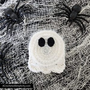 Free Crochet Pattern - Black Cat Dish Scrubby by A Crocheted Simplicity #freecrochetpattern #crochetscrubby #crochetscrubbypattern #crochetdishscrubby #halloweencrochet #crochetblackcat #blackcat #crochetkitchen #crochet #handmade #halloweencrochet #crochetghost #ghost #ghostdecor