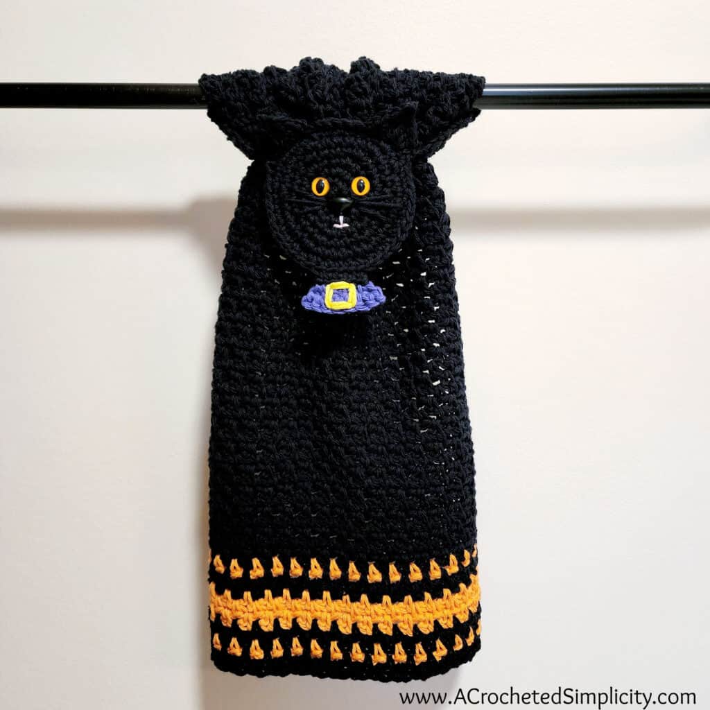 Free Crochet Pattern - Kitty Cat Towel by A Crocheted Simplicity #crochetcat #freecrochetpattern #freecrochetalong #blackcatCAL #crochetblackcat #halloweendecor #blackcatHalloween #stripedtabbycat #crochettabbycatpattern #crochettabbycat #stripedcrochetcat