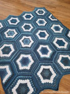 Free Crochet Hexagon Afghan- Succulent Spring Hexagon Afghan by A Crocheted Simplicity #crochetlapghan #freecrochetpattern #crochethexagonsquare #crochethexagonafghan #crochethexagonblanket #crochetafghansquare #12incheafghansquare #freecrochetblanketsquare #crochettextures #crochetafghan #crochetblanket #freehexagonafghanpattern #lionbrandferriswheel #seaglass