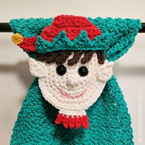 Free Crochet Towel Pattern - Elf Kitchen Towel by A Crocheted Simplicity #freecrochetpattern #crochettowelpattern #christmastowel #elfkitchentowel #elftowel #crochetelf #crochetelftowel #crochetchristmaself #handmadetowel #christmaself #stayputtowel #keyholetowel