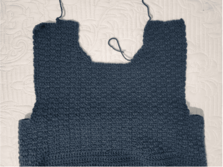 Upper panel of a crochet mens sweater.