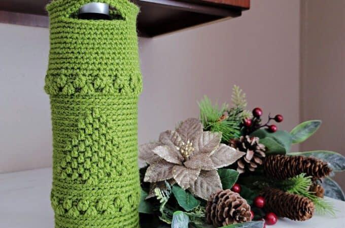 Free Crochet Wine Tote Pattern - O' Christmas Tree Wine Tote by A Crocheted Simplicity. #crochetchristmas #handmadechristmas #crochetwinetote #crochetwinecozy #winetote #winecozy #christmaswinetote #crochetchristmaswinetote #crochetchristmastree #freecrochetpattern #winetotepattern #crochetwinetotepattern #lastminutecrochetgifts