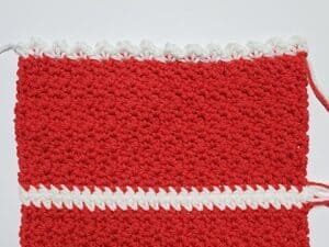 Mrs. Claus Kitchen Towel - Free Crochet Christmas Pattern by A Crocheted Simplicity. #freecrochetpattern #crochetchristmaspattern #freecrochetchristmaspattern #freecrochetmrsclauspattern #mrsclauscrochetpattern #crochetmrsclaus #handmadechristmas #crochettowel #crochetchristmastowel #santaclauscrochet #crochetsantaclaus