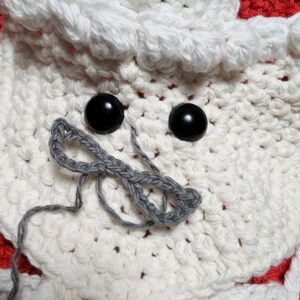 Mrs. Claus Kitchen Towel - Free Crochet Christmas Pattern by A Crocheted Simplicity. #freecrochetpattern #crochetchristmaspattern #freecrochetchristmaspattern #freecrochetmrsclauspattern #mrsclauscrochetpattern #crochetmrsclaus #handmadechristmas #crochettowel #crochetchristmastowel #santaclauscrochet #crochetsantaclaus
