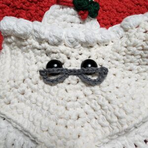 Mrs. Claus Kitchen Towel - Free Crochet Christmas Pattern by A Crocheted Simplicity. #freecrochetpattern #crochetchristmaspattern #freecrochetchristmaspattern #freecrochetmrsclauspattern #mrsclauscrochetpattern #crochetmrsclaus #handmadechristmas #crochettowel #crochetchristmastowel #santaclauscrochet #crochetsantaclaus