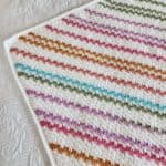 Close up of a striped c2c afghan.