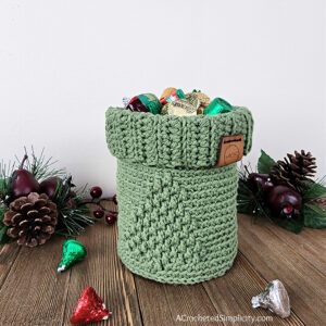 Crochet Mason Jar Cozy - O' Christmas Tree Jar Cozy - Free Crochet Jar Cozy Pattern by A Crocheted Simplicity #freecrochetpattern #crochetmasonjarcozy #crochetjarcozy #crochetjarcozypattern #christmasmasonjarcozy #crochetchristmas #christmasdecor #crochetchristmasdecor #crochettreedecor #crochetcandydish #crochetbasket #crochetcandybasket #crochetcandlecozy #freemasonjarcozypattern #handmadechristmas #lastminutecrochetgift #quickcrochet