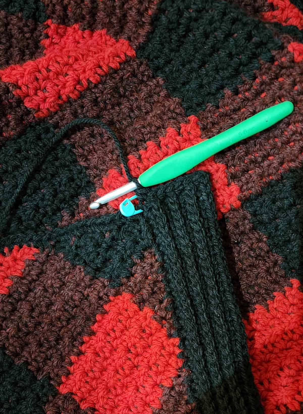 This image is showing how to crochet into the ends of the ribbed rows.