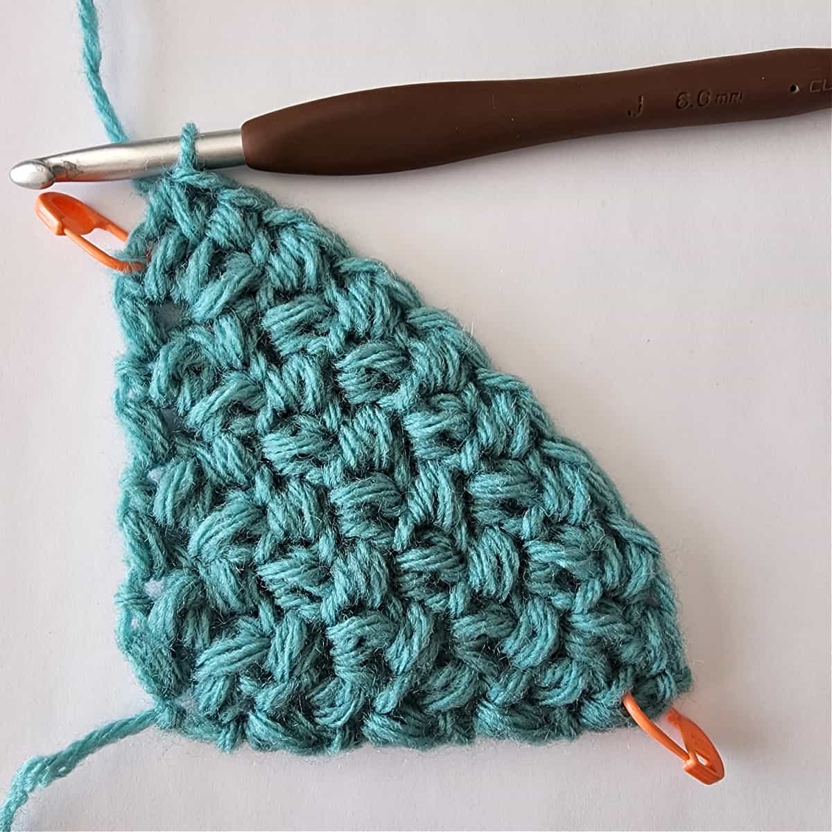 Aqua color yarn with mini bean stitch worked corner to corner.