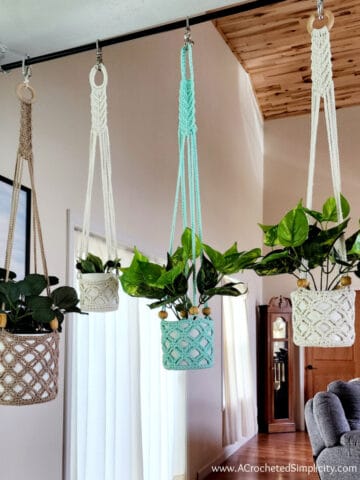 Four different crochet plant hangers in cotton yarn with wooden beads in square photo.