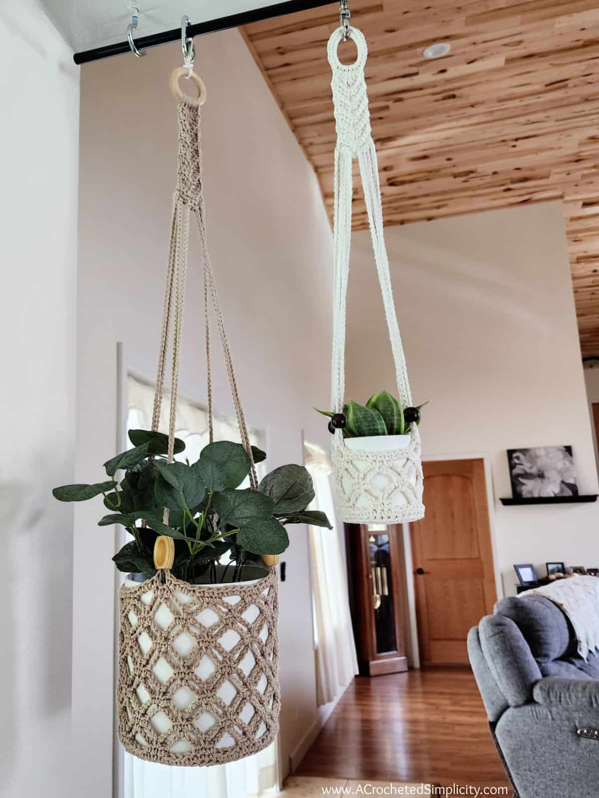 Large taupe and small ecru crochet plant hangers.