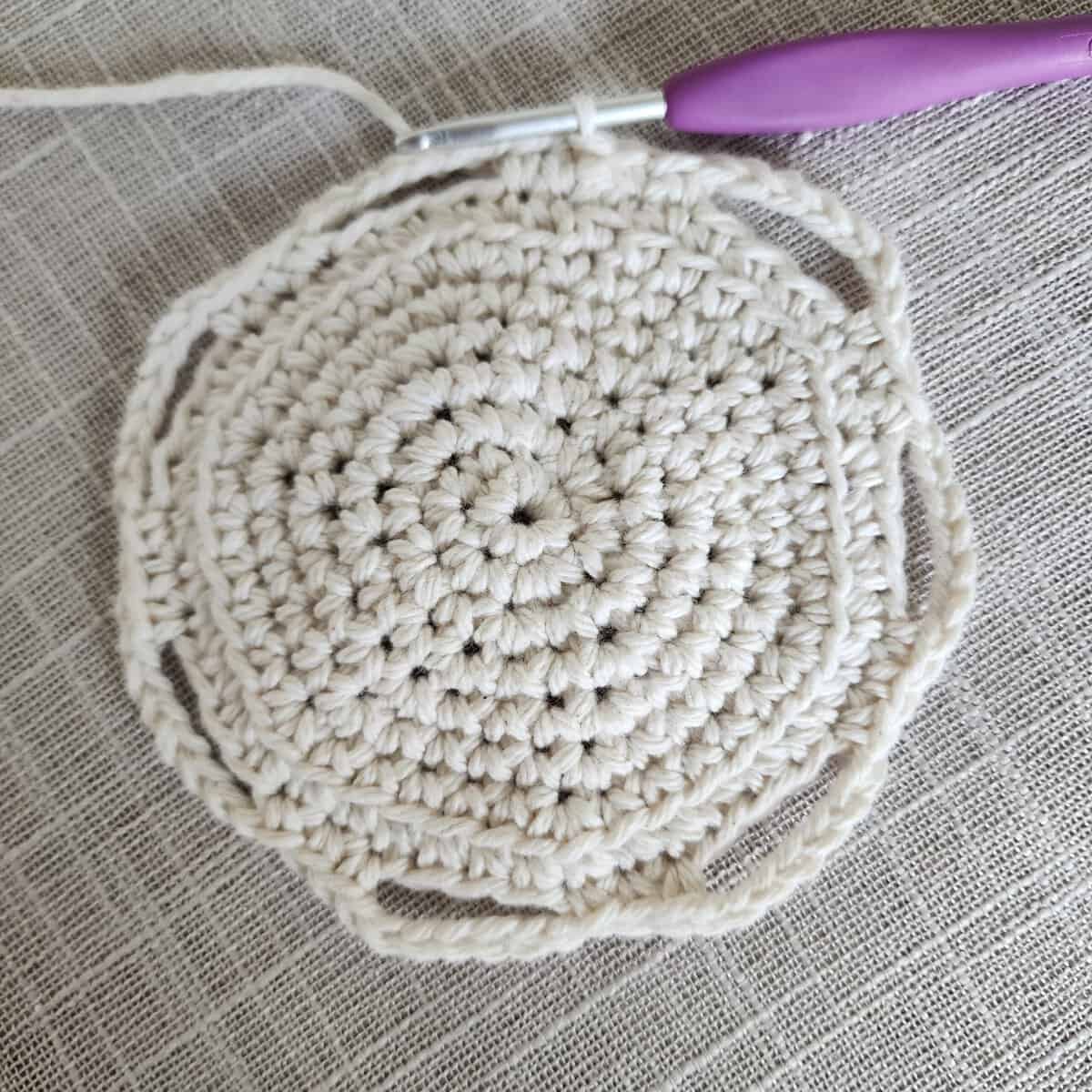 Small crochet circle for base of plant hanger basket.