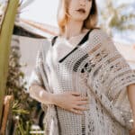 adult woman modeling crochet cover up