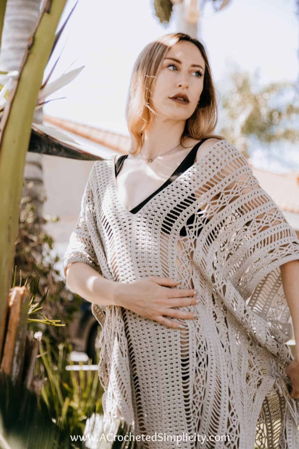 adult woman modeling crochet cover up