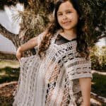 young girl modeling new crochet swim cover