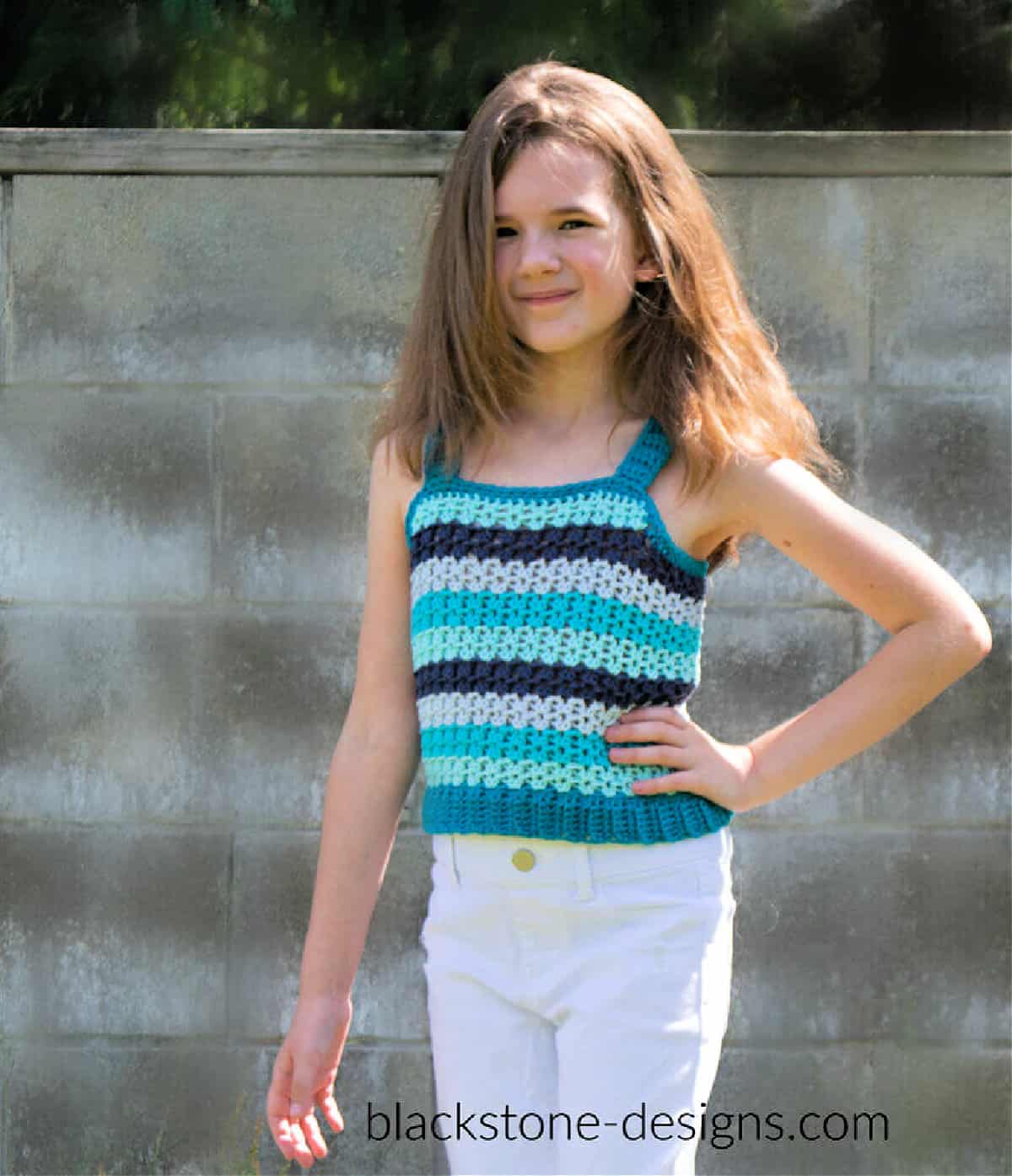 Young girl modeling a crochet tank top