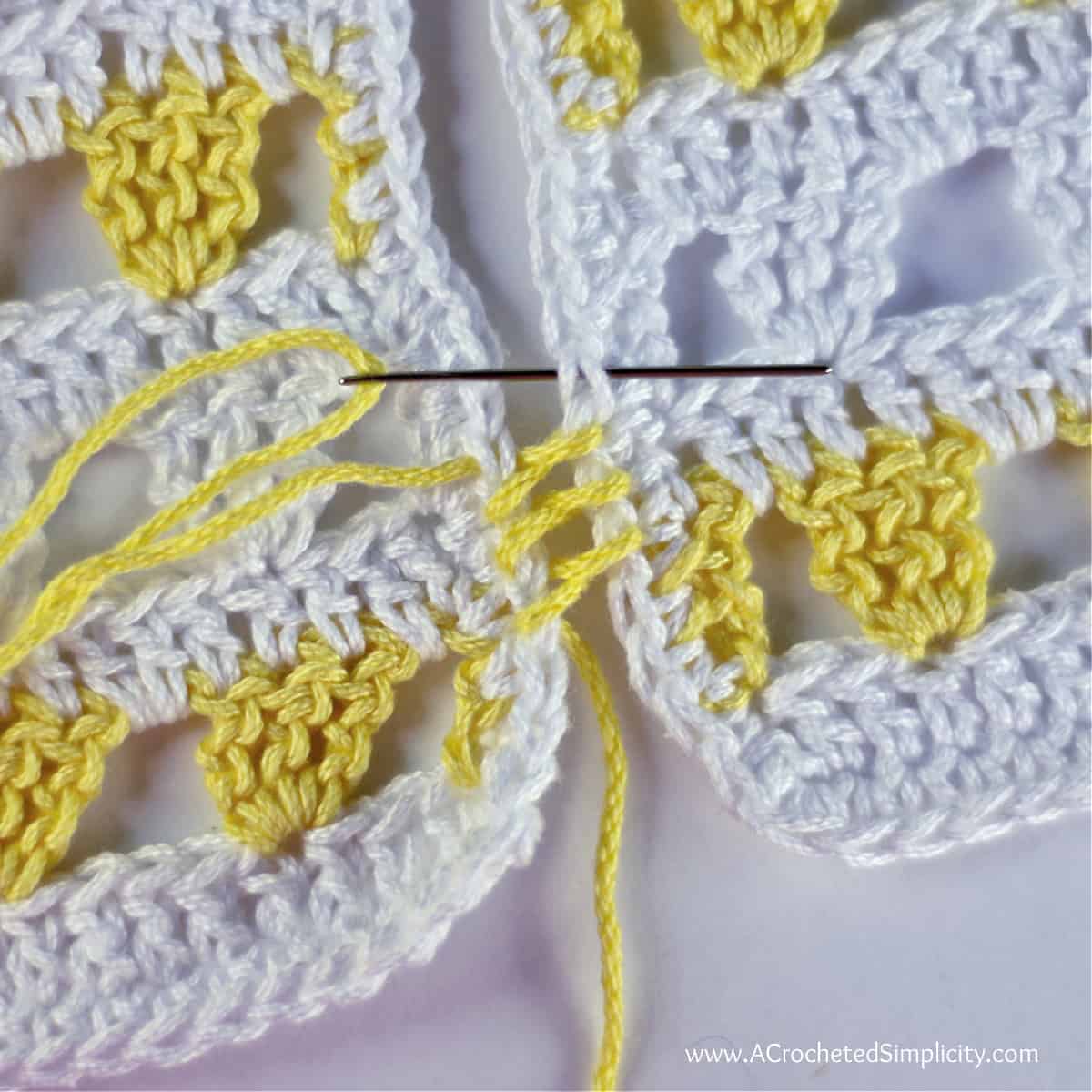 This photo shows the mattress stitch crochet seam after a few stitches are worked back and forth.