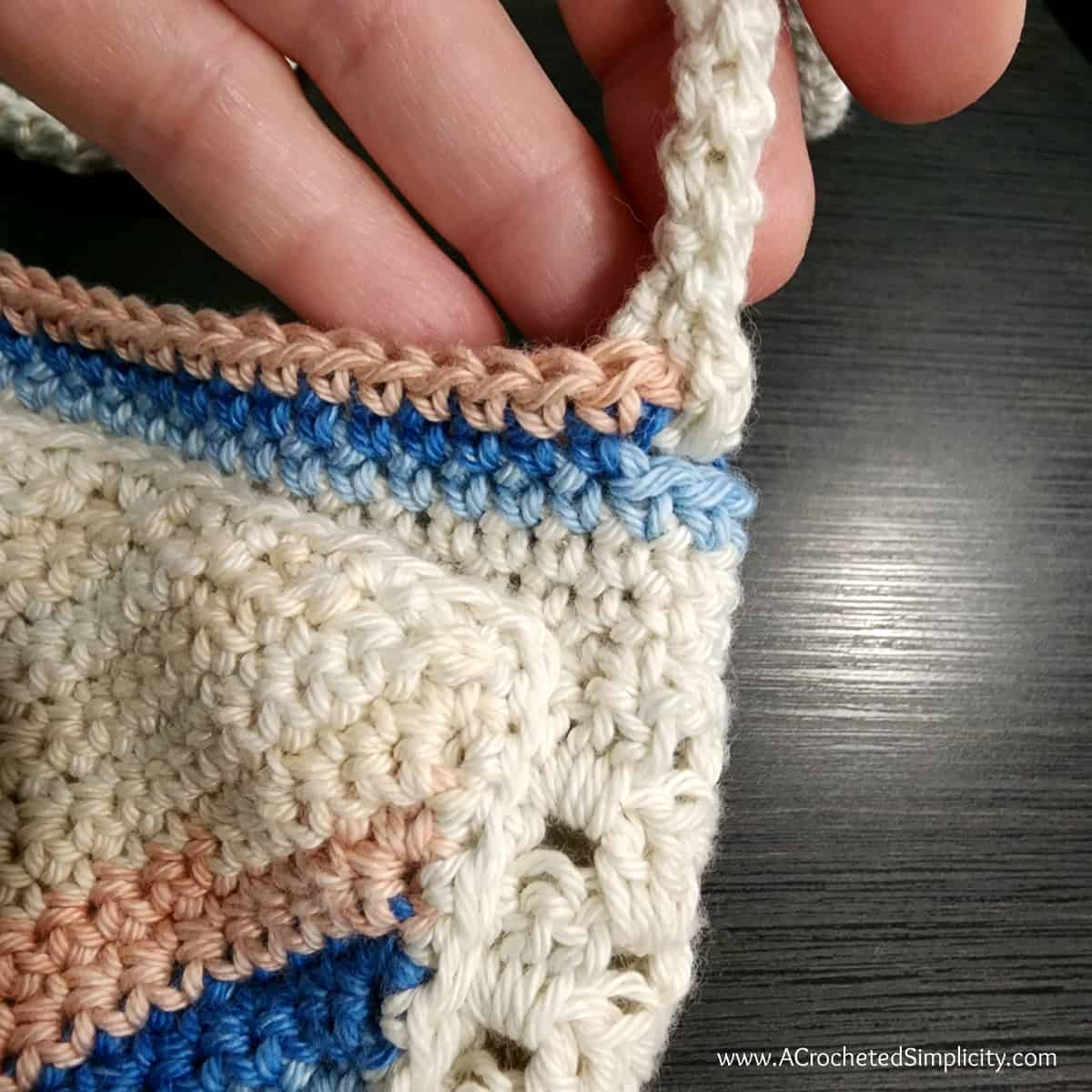 Close up showing the secured stationary crochet strap.