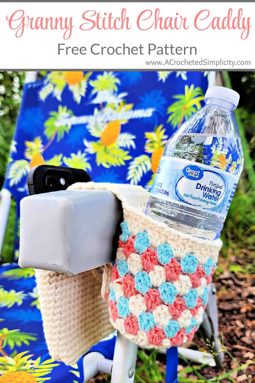 Crochet chair caddy in granny stitch to hold a water bottle and cell phone.