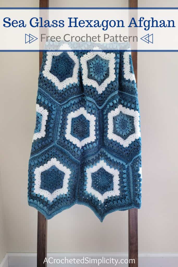 Crochet hexagon blanket on blanket ladder.