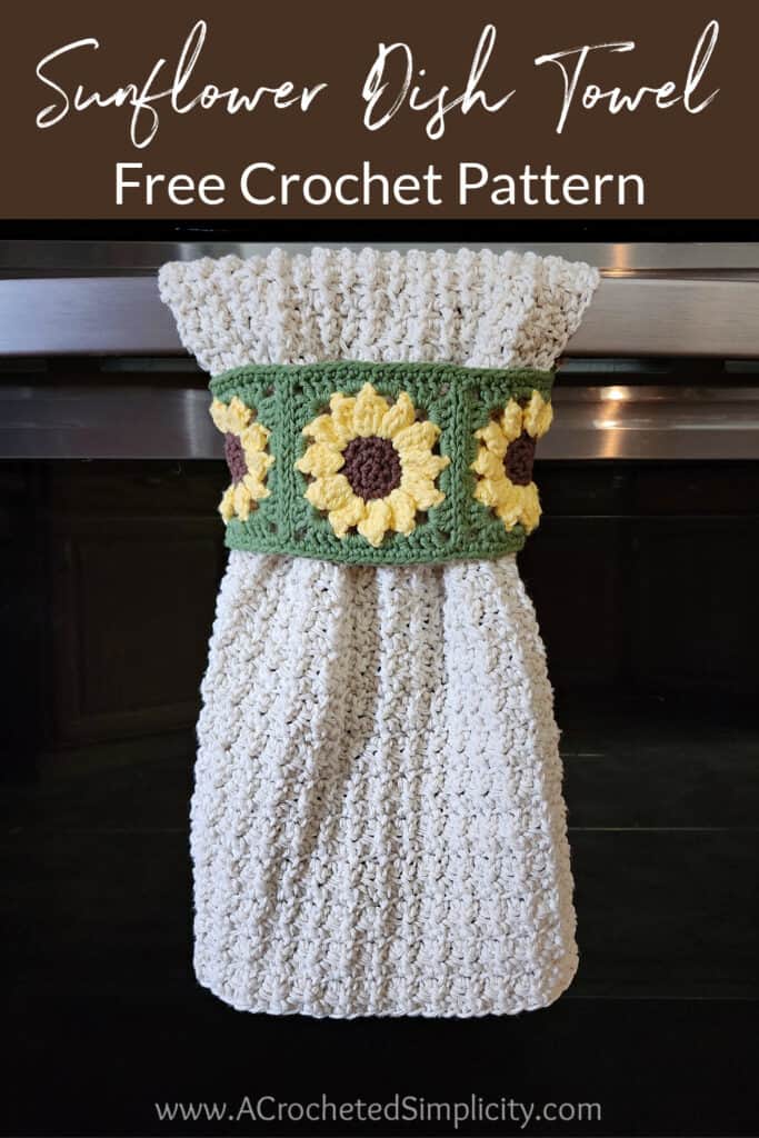 Sunflower keyhole crochet kitchen dish towel hanging on oven door.