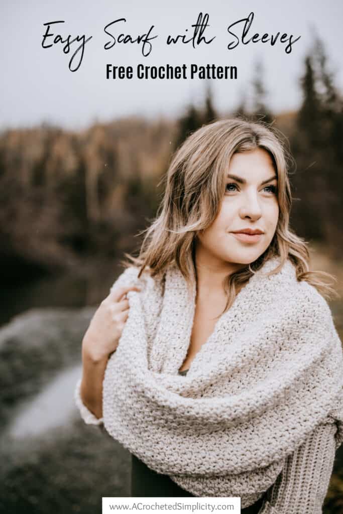 Pinterest photo of a model wearing a crochet scarf with sleeves as a cowl.