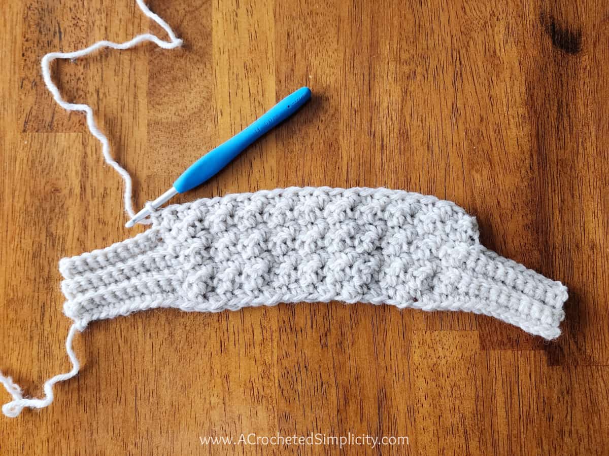 Photo tutorial to show how to crochet a seamless transition from regular rows to short rows.
