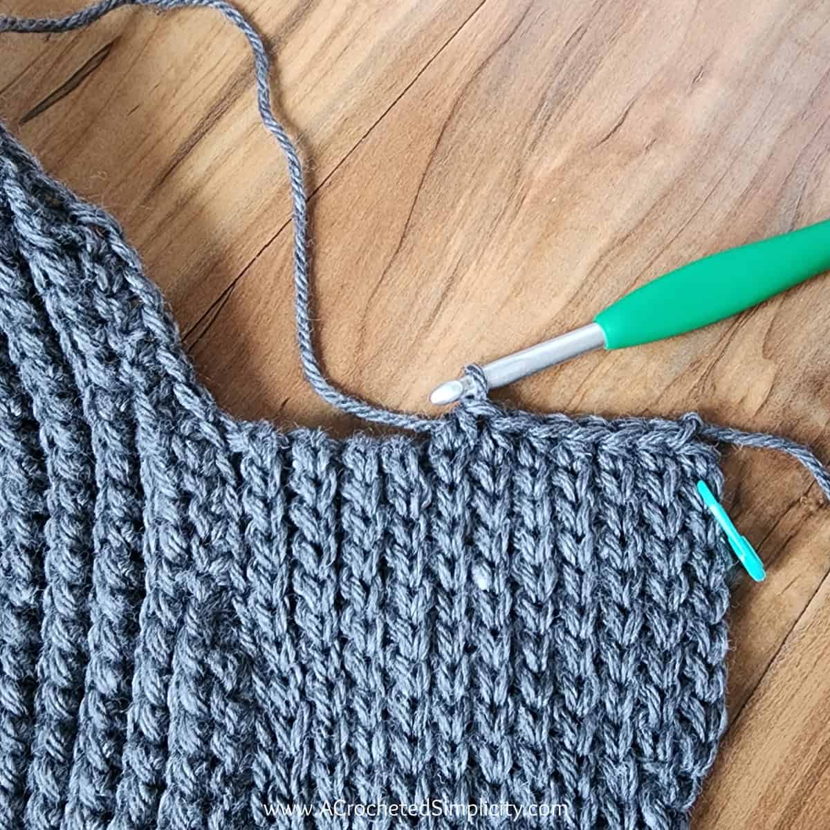 Photo shows how to begin ribbing on shawl collar cardigan