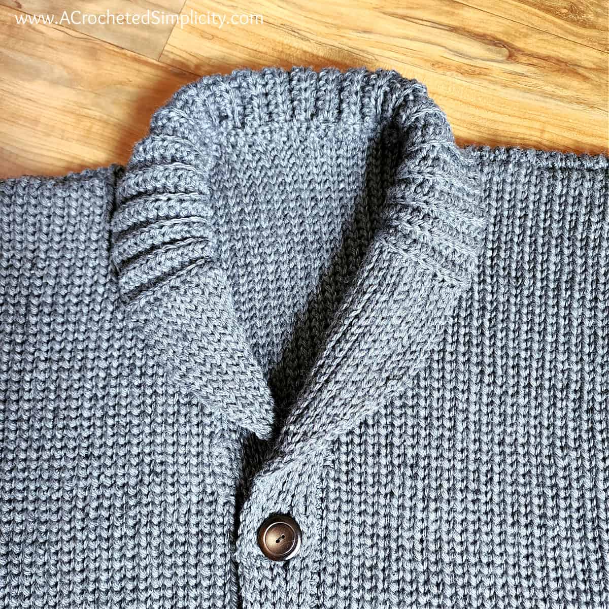 close up photo of the shawl collar on a mens cardigan