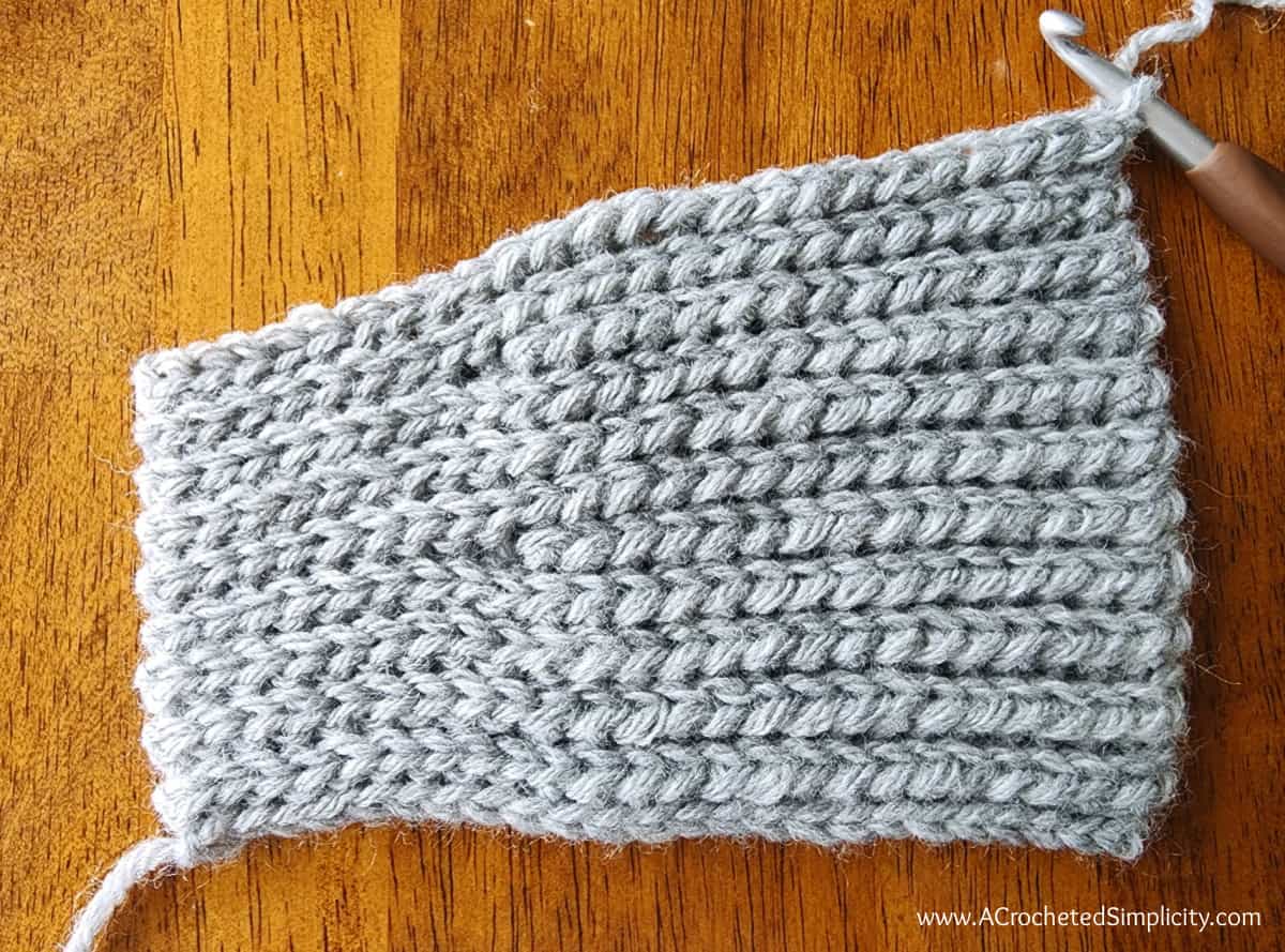 Larger swatch of crochet yarn over slip stitch with short rows