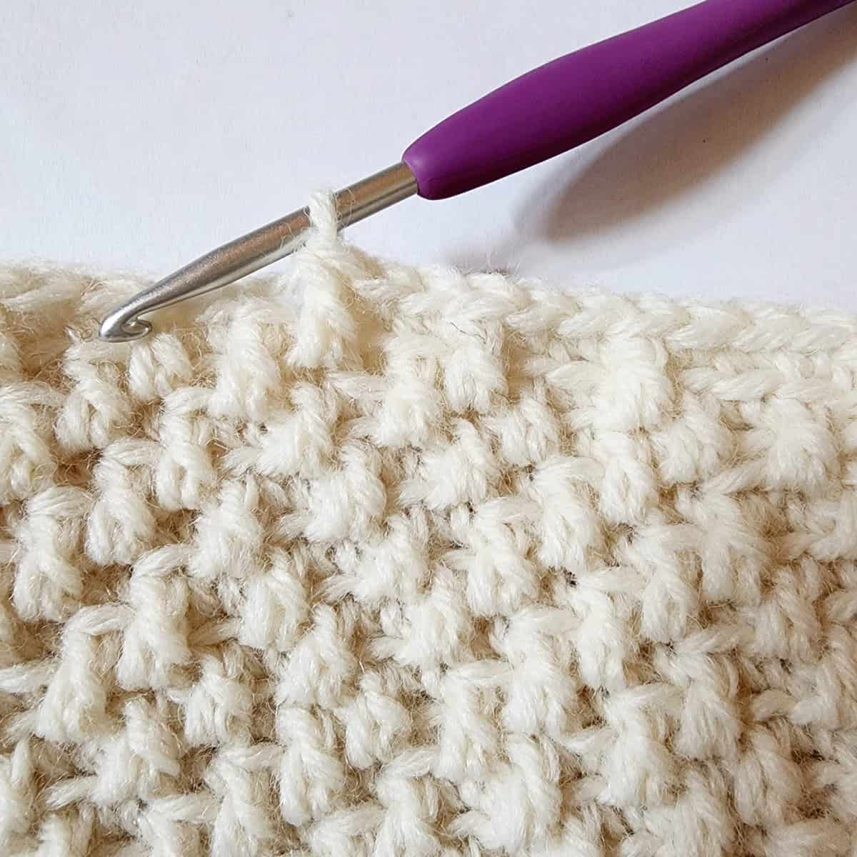 close up of a classic crochet stocking showing where to work a double crochet in front loops only