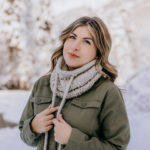 woman wearing a crochet drawstring cowl outside in winter