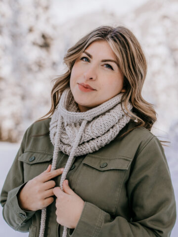 woman wearing a crochet drawstring cowl outside in winter