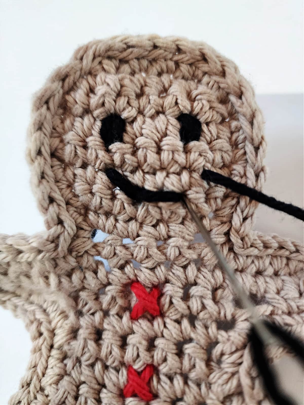 gingerbread man crochet mouth tutorial 3