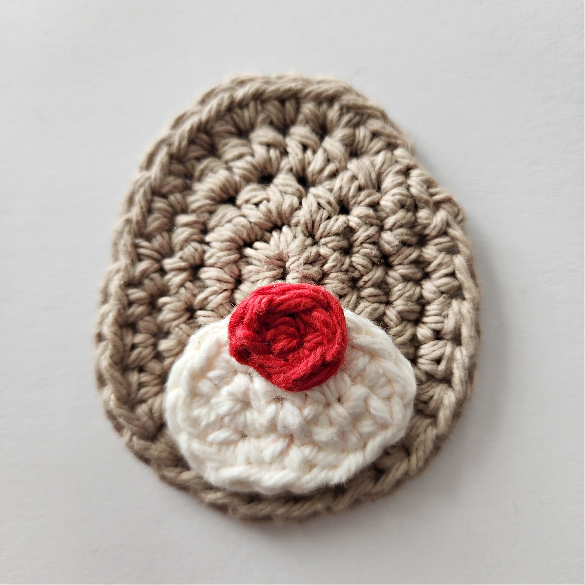 tutorial for adding muzzle and red nose on crochet reindeer candy cane holder