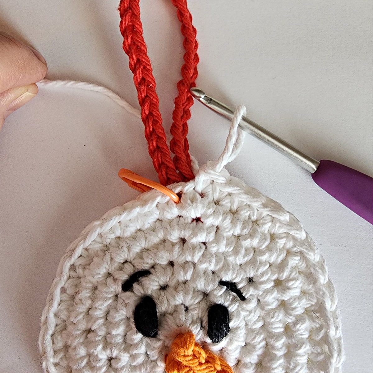 single crochet around hanging loop