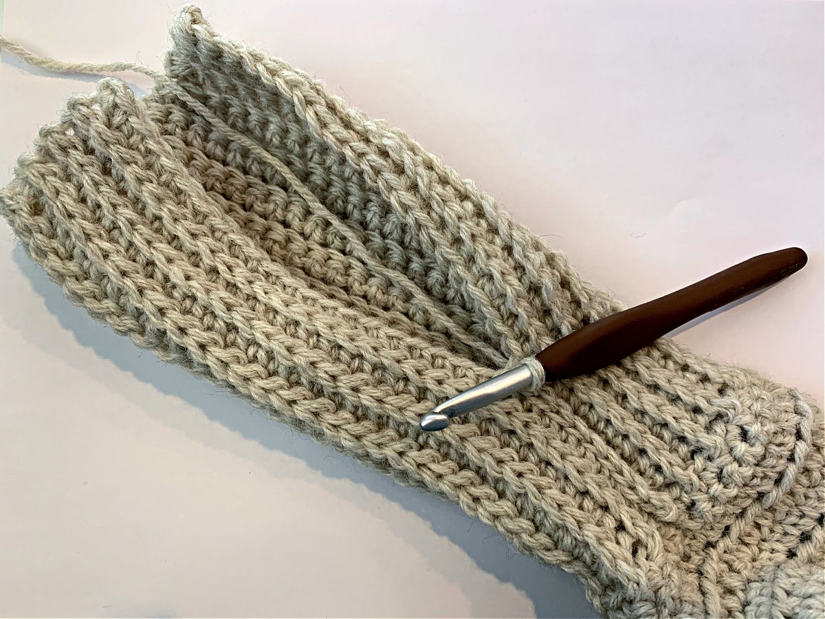 Tutorial photo showing seaming of the stretchy sleeve cuff.