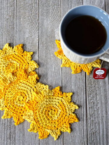 Sun shaped crochet coasters stacked together.