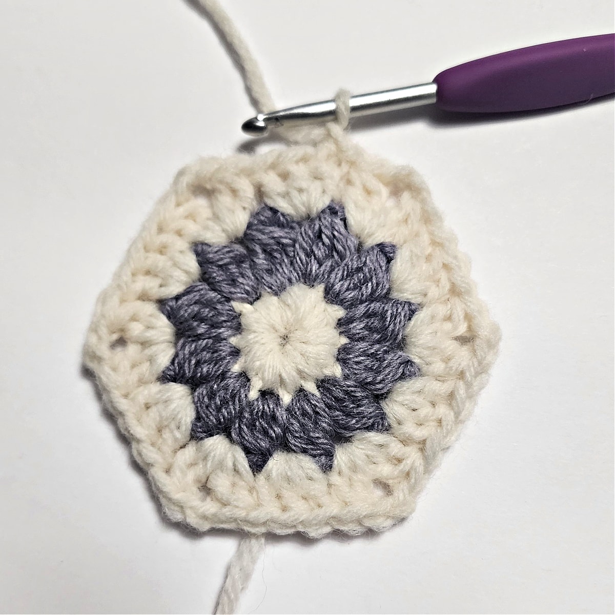 Small crochet hexagon granny square.