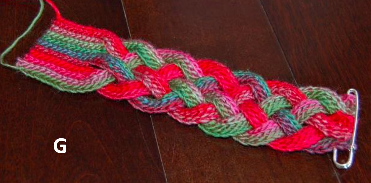 A completed crochet braid made by pleating different strands together.