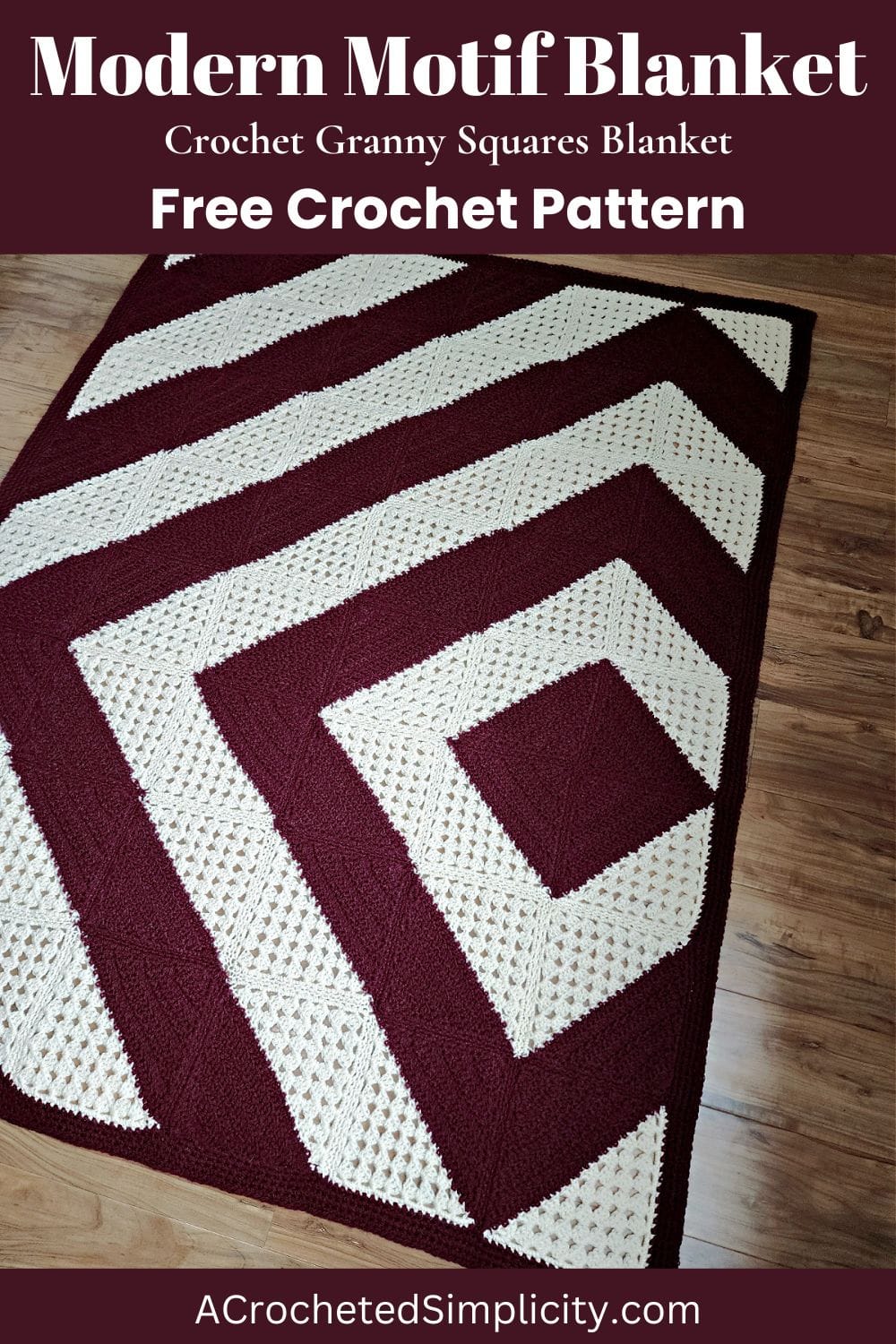 Granny squares crochet blanket spread over the wooden floor.
