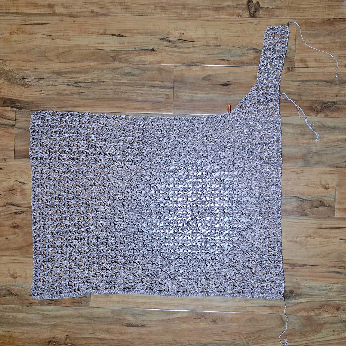 The body of the crochet vest and front right panel complete.