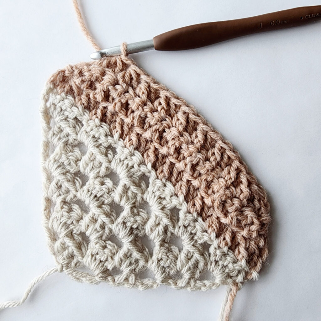Third row of decrease of a crochet granny square motif.