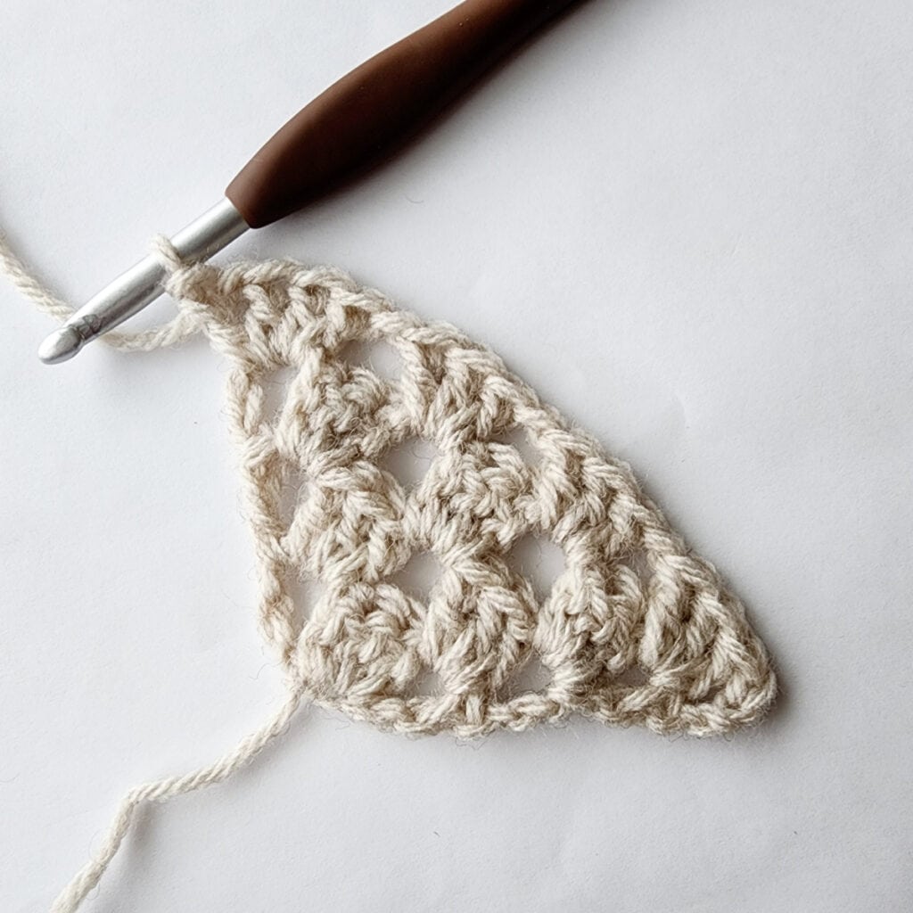 Fourth row of increase of a crochet granny square motif.