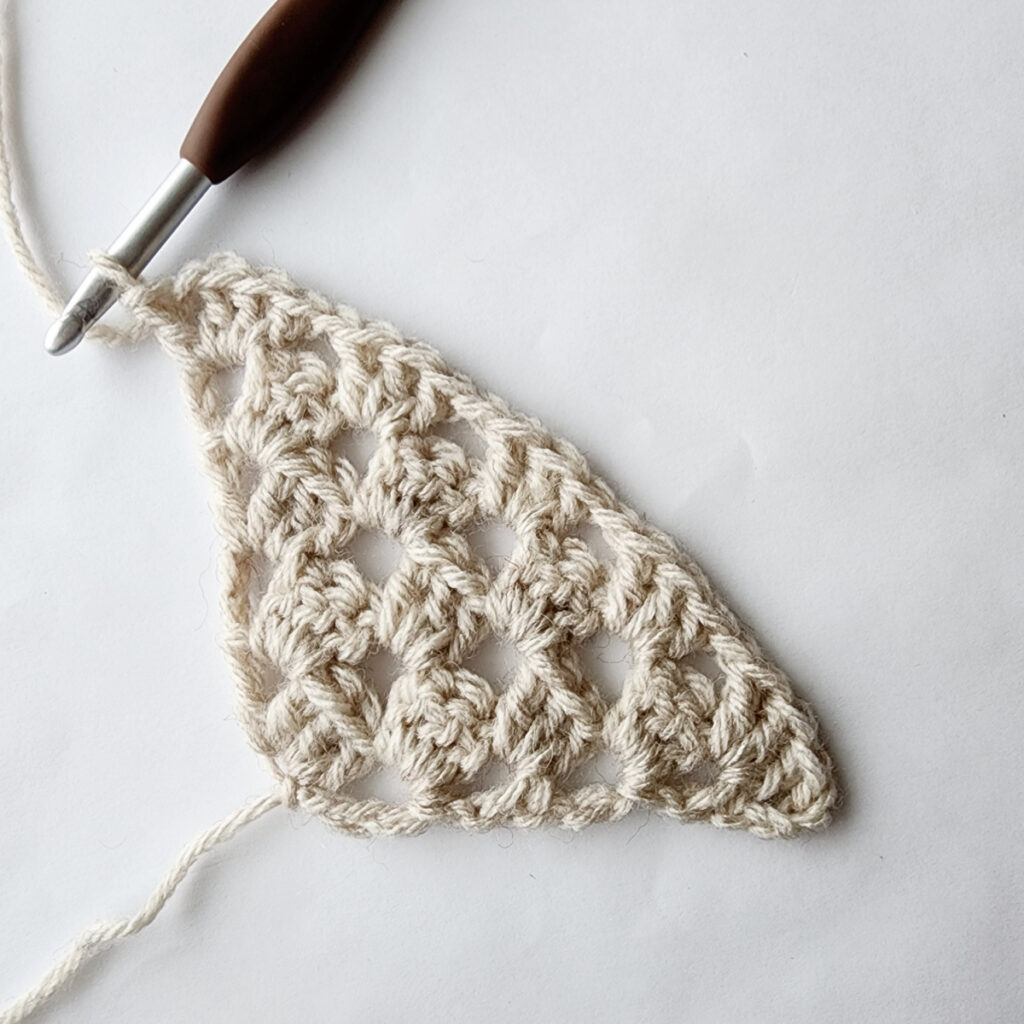 Fifth row of increase of a crochet granny square motif.