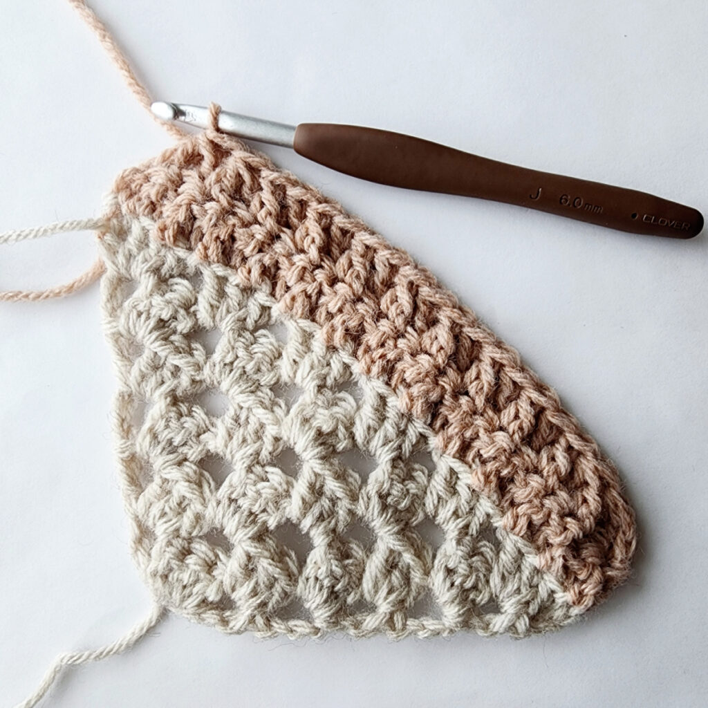 Second row of decrease of a crochet granny square motif.