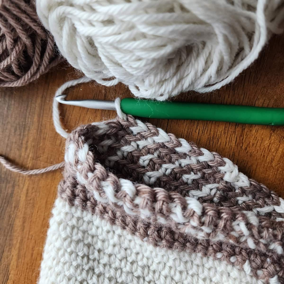 Working the tapestry crochet section of the slipper boot.