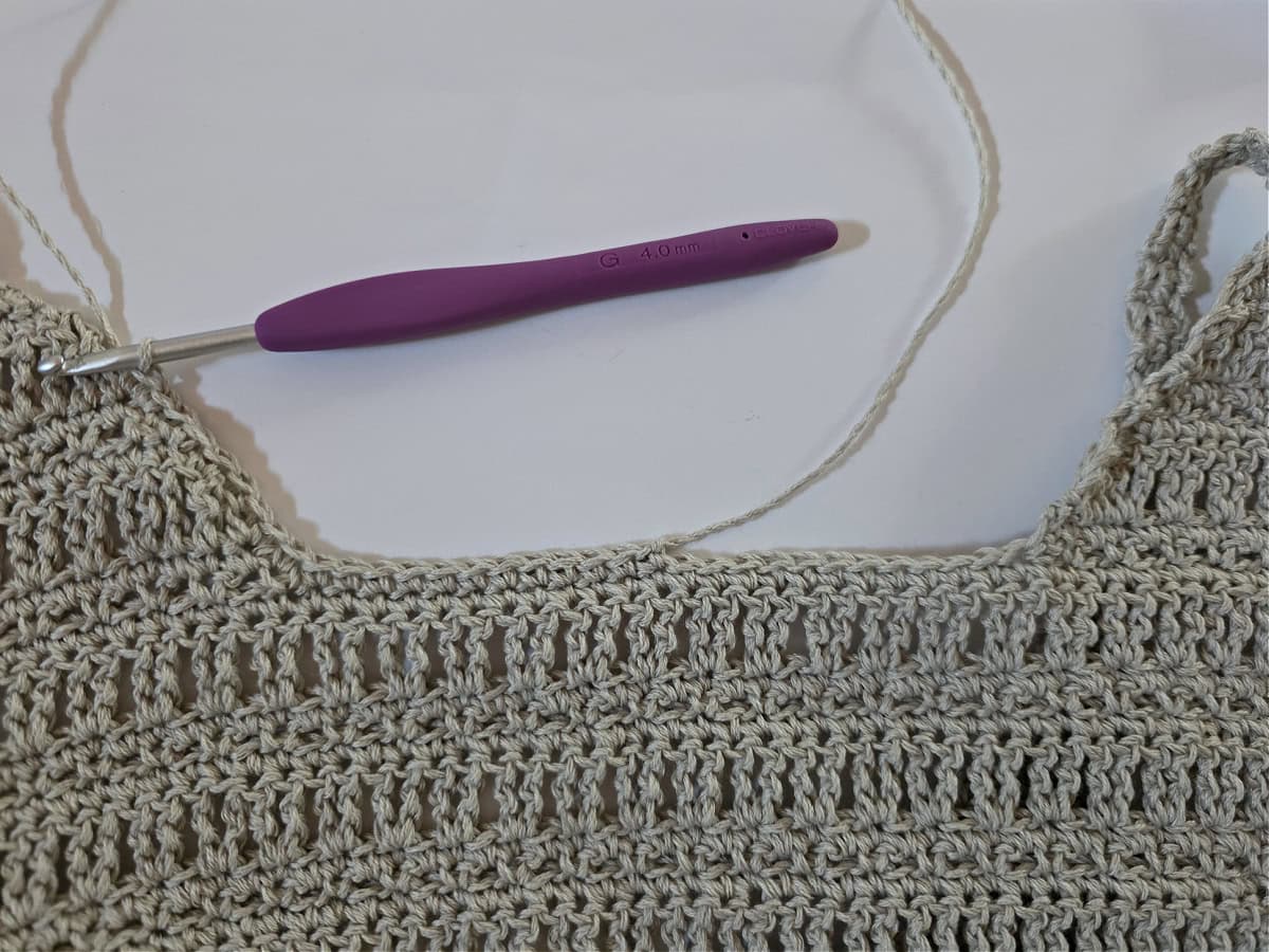 Yarn joined at the center back of the neck opening for the Set-Up round before adding the Neck Ribbing of the crochet tank top.